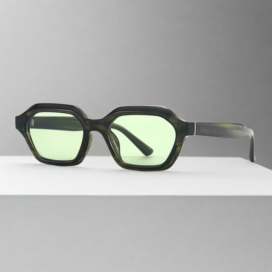 Sunglasses with green lenses and black frame on a white background
